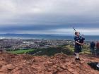 At the top of Arthur's Seat, you can sometimes find a boy playing the bagpipes