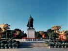 A sculpture of an emperor from the Qing Dynasty in a park near my house