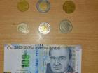 100 soles bill and Peruvian coins 