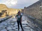 Standing in the ancient city of Pompeii