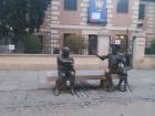 These statues are of Sancho and Don Quijote, characters from Cervante's most famous book book