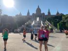 My friend and I are standing in front of the Magic Fountains in Barcelona after running a 6 mile road race!