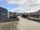 In the middle of this photo is the path on the Lugo city wall. On the left is the new section of the city center, and on the right is the old city center inside the wall