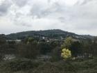 The Termas de Outariz (Outariz hot springs) are located right next to the River Miño in a steep valley with hills on either side.  This is the view from the hot springs of the hills on the other side of the river