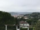 This is a view of the center of Ourense from A Capela da Portela, a park in a town called A Granxa on a hill outside of the city.  The lousy weather still does not deter Galician people from getting together outside to spend time with each other