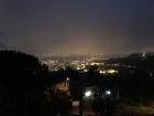 This is the same view from A Granxa at night. You can see how foggy it is as the city lights try to shine through the dense fog and the low, thick cloud cover