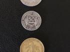 Some common Senegalese coins: 5 XOF=.008 USD, 10 XOF =.017 USD, 25 XOF =.042 USD,100 XOF = .167 USD, 200 XOF=.334 USD