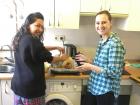 My Canadian roommate and I making a turkey in our kitchen for Thanksgiving
