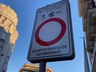 In the city center only certain cars are allowed on the street to try to reduce pollution. This sign explains which cars are allowed in a certain zone