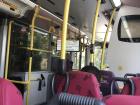 The bus, with English and Chinese translations of the bus stops