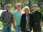 My brother, father, mother, and me.