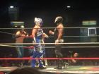 Two Luchadores go toe-to-toe in the ring. What an exciting match!