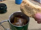 Trying my first rusk by dipping it into my cup of rooibos tea
