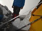 At Camp 2 on Mount Everest, we chip ice out of the glacier to melt for drinking water