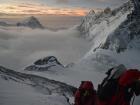 Climbing above the South Col of Everest one can see into China, where Makalu, the world’s fifth highest mountain, looms above the clouds to the left, and Lhotse, the world fourth highest mountain, stretches up and out of the picture to the upper right
