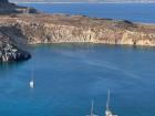 The beautiful blue water of Lindos harbor