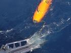 A Hugin AUV returning to the ship after its search mission