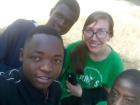 Here I am with three members of my youth group, called "Jovens Unidos no Trabalho Para Oportunidades e Sucesso"