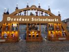 The entrance to the Striezelmarkt, with a very large "Schwibbogen" (candleholder)