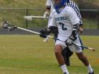 Playing lacrosse for my high school team, getting ready to shake and bake 