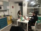 This is a photo of my friends Sven and Clemonce hanging out in the kitchen of my building. Many of us meet in the kitchen and it's a good place to eat and chat