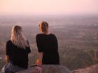 Two of my friends looking out at the dry landscape from on top of a hill 