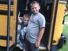 My two boys, Cody and Colt, in front of my bus 
