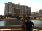 My boyfriend and I pose for the camera in front of Caesar's palace in Las Vegas, Nevada