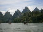 I'm enjoying a boat ride in Yangshuo, China, one of my all-time favorite places in China!