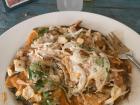 Another great meal of chilaquiles which is made of chips with cheese, sauce and beans