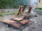 All you need for a parilla is fire, a metal grate, and meat (Source: Pick Up the Fork)
