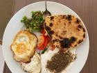 My attempt at a Jordanian breakfast under quarantine: fried eggs, fresh vegetables, flatbread and greek yogurt (labneh) with herbs (zatar)