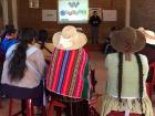 Women from outside the city gather for a workshop on supporting children with disabilities