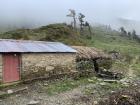 Stone wall homes in Karan's village