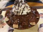 This is chocolate flavored Bingsu(빙수). Bingsu is essentially flavored shaved ice and is best shared with friends!