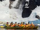 The Inspiring Explorers team kayaking together in Antarctica