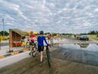 Crossing a wildlife border, disinfecting our feet and bikes