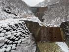 A dam maintains the steady flow of hot water through Hakone