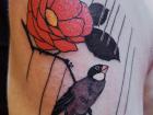 My first tattoo, the sparrow and the camellia
