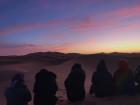 Here we are all bundled up, watching the sunrise over the desert!