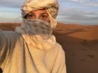 The Amazigh people often wear a long garment called a "tagelmust" to protect their face from the desert sand and elements