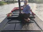 Here I am on a boat called a "sampan;" it's a larger boat, and we even ate dinner on the sampan!