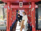 My friends posing under decorative torii inside one of the many Mandrake stores in Nakano