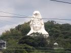 A view of Kannon statue head at Ofuna Kannon Temple through the train window while on my way to Kamakura
