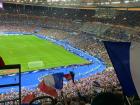 The crowd in the stadium was divided between supporters for each team, and I sat on the French team side, so I could wave my huge French flag! 