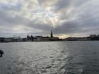 Traveling by boat within Stockholm in view of the church steeples 