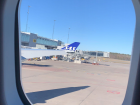 Beautiful day as I boarded the plane heading home!  (In Swedish, the sentence says "I love you, Stockholm")