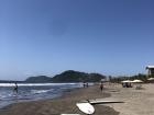 Surfing at Jacó Beach