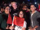 My friends and me with some Chinese flags at the Anniversary community event