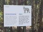 This ICIMOD Knowledge Park sign reminds visitors to stick together because of wildlife, like panthers